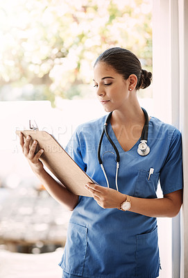 Buy stock photo Woman doctor, clipboard and check notes for medical service, hospital documents and nursing registration or information. Report, analysis and professional nurse or healthcare person with checklist