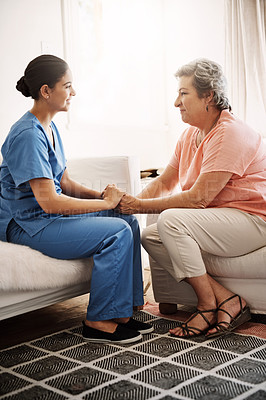 Buy stock photo Caregiver, woman and holding hands of support in clinic for patient support, sympathy or empathy by consultation of medical results. Healthcare, trust or hope of counselling together at nursing home
