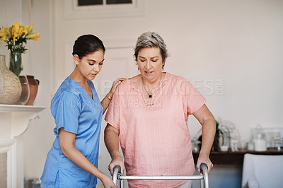 Buy stock photo Caregiver, woman and helping with walker at nursing home for mobility support, physical therapy or hope for healing disability. Nurse, patient and physiotherapy for anatomy, balance or rehabilitation