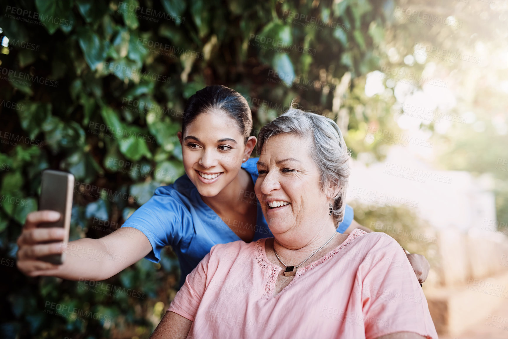 Buy stock photo Assisted living, selfie and smile of nurse with old woman outdoor at retirement home for social media. Healthcare, medical or memory with happy caregiver and senior patient in garden for photograph