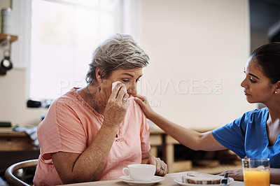 Buy stock photo Crying, woman and caregiver for support at nursing home with consultation, medical results or helping comfort of counselling. Nurse, patient and sad with empathy, sympathy and retirement healthcare