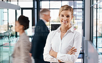 Buy stock photo Portrait of a young businesswoman standing in a busy office