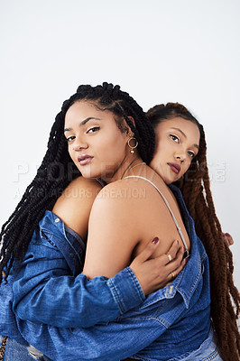 Buy stock photo Portrait, studio and lgbt women with hug, trust or support with gen z partner, pride and denim fashion. Love, solidarity and lesbian couple embrace together with cool trendy style on white background