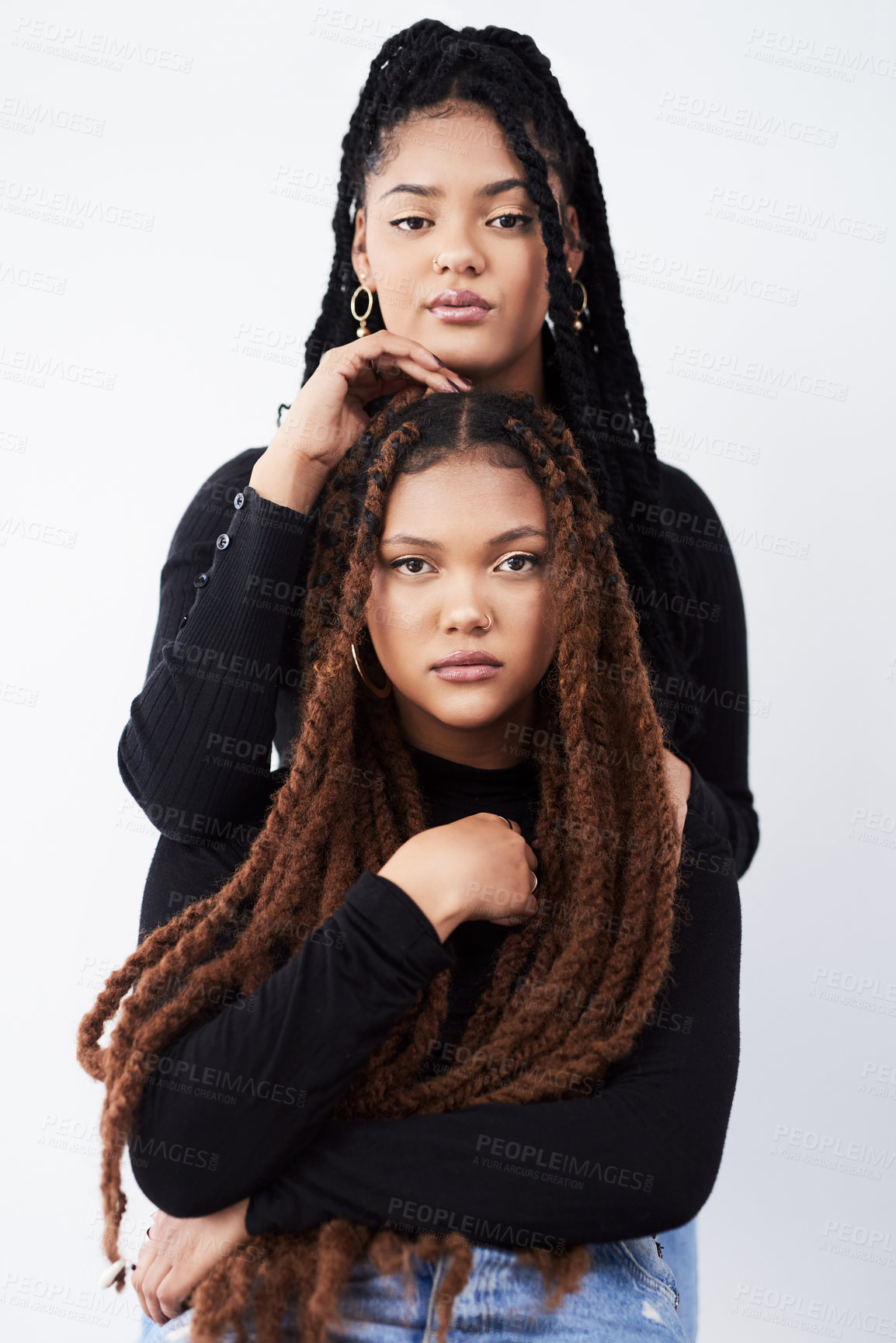 Buy stock photo Lesbian couple, portrait and fashion in studio with pride for style inspiration, jeans and together. Serious, lgbt and black people for support with women, relationship and dreadlocks with clothes