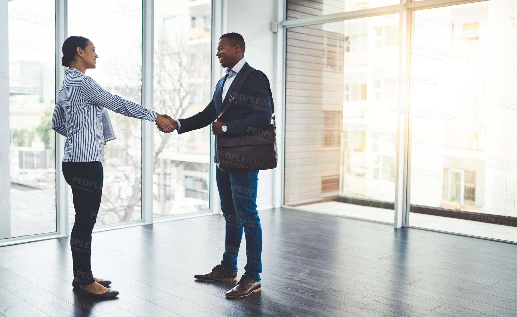 Buy stock photo Handshake, deal and business people in office with partnership, agreement and b2b merger. Welcome, greeting and hr manager shaking hands with hiring candidate for corporate onboarding in workplace.