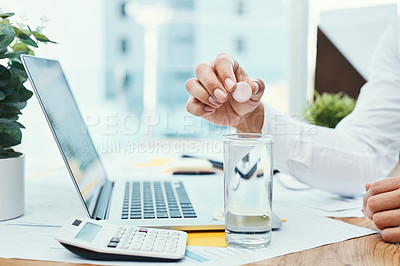 Buy stock photo Shot of an unrecognizable businessman dissolving an effervescent tablet in a glass of water