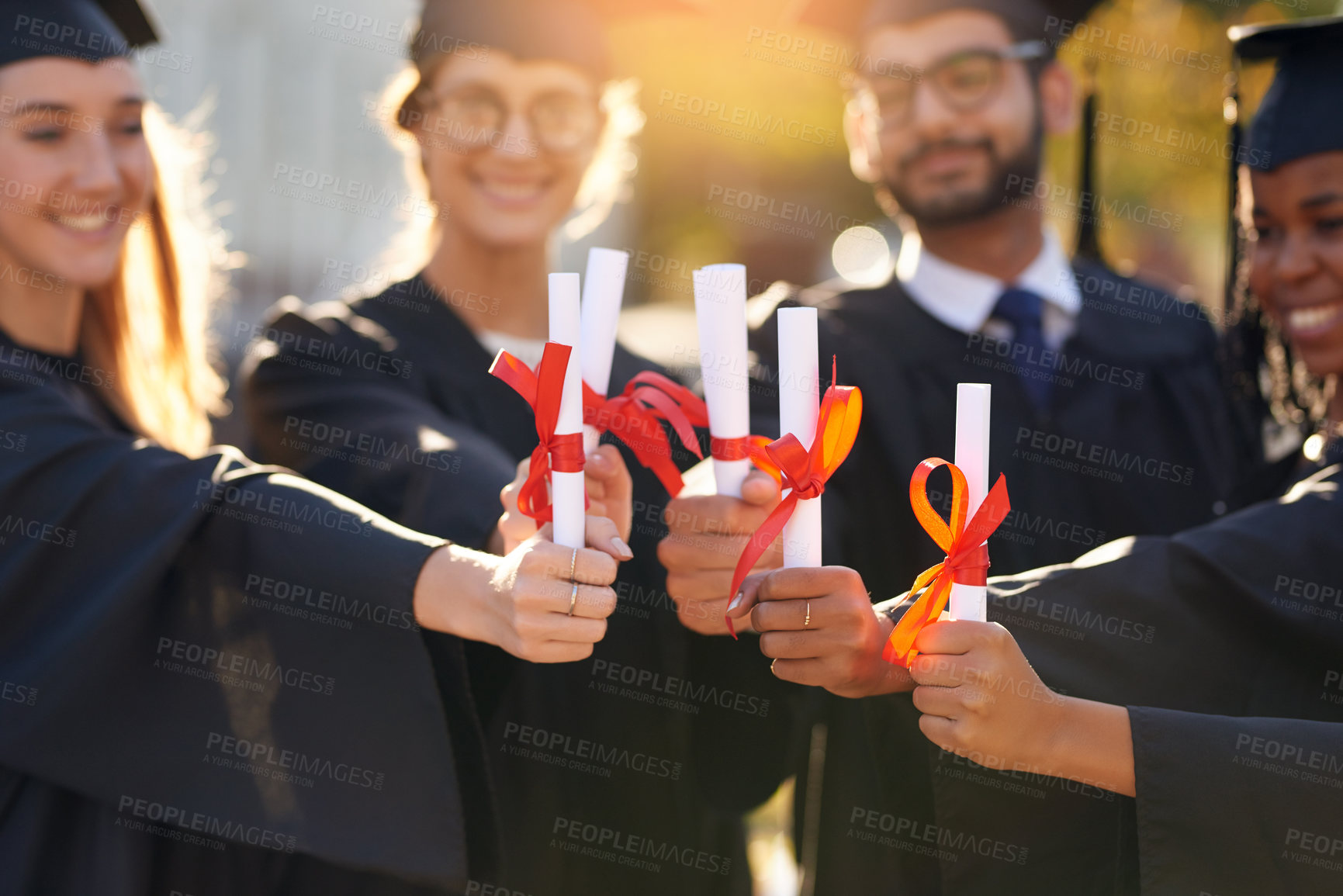 Buy stock photo Group, students and graduation diploma with friends hands of college or university people. Men and women outdoor to celebrate education achievement, success and certificate at school for graduates