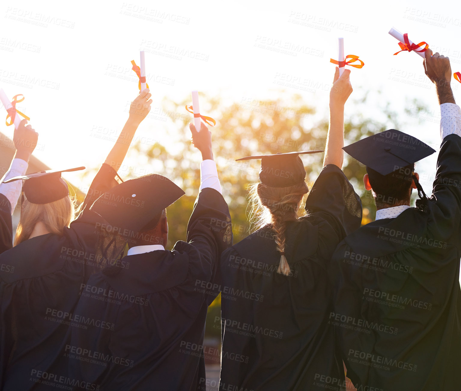 Buy stock photo Group, students and graduation diploma of college or university friends together from behind. Men and women outdoor to celebrate education achievement, success or certificate in hands at school event