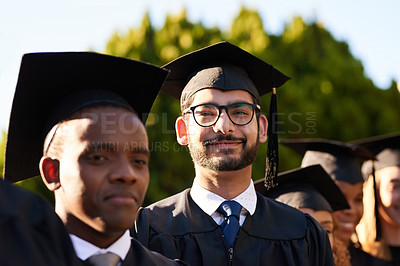 Buy stock photo Graduation, achievement or portrait of man with confidence at university for education or success. College, scholarship or proud student with group of people at campus with degree, smile or diploma