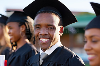 Buy stock photo Black man portrait, student and graduation with group class at ceremony for education, qualification or future. Happy person and scholar with smile for diploma, certificate or degree on campus