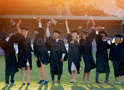 Buy stock photo Graduation, outdoor or portrait of students award with class at university for education or success. College, excited friends or happy people at campus with degree, smile or certificate for diploma