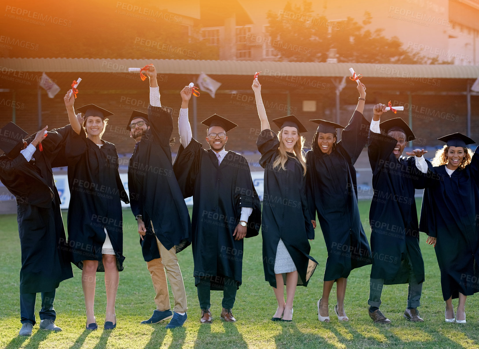 Buy stock photo Graduation, outdoor or portrait of students award with class at university for education or success. College, excited friends or happy people at campus with degree, smile or certificate for diploma