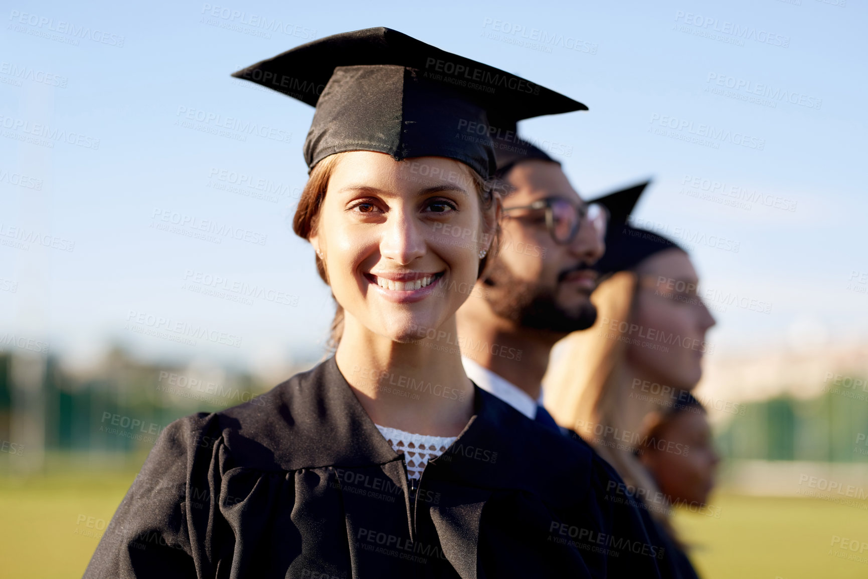 Buy stock photo Happy woman, portrait and student with graduation class for academic achievement or qualification at ceremony. Young, female person or graduate with smile for milestone, scholarship or college degree