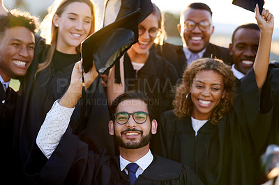 Buy stock photo University, graduation and portrait of people with smile for education, achievement and success. Happy, students and friends with celebration at campus field for qualification, learning and knowledge