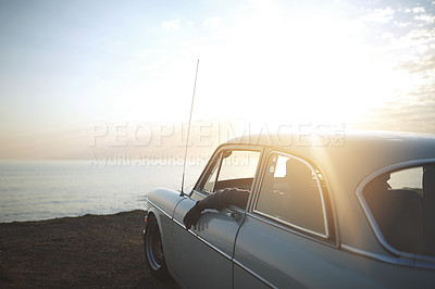 Buy stock photo Rearview shot of a car pulling over by the beach