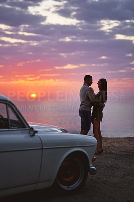 Buy stock photo Sunset, hug and road trip with couple at beach for travel destination, care and honeymoon vacation. Love, transport and adventure with man and woman for holiday, bonding and romance together