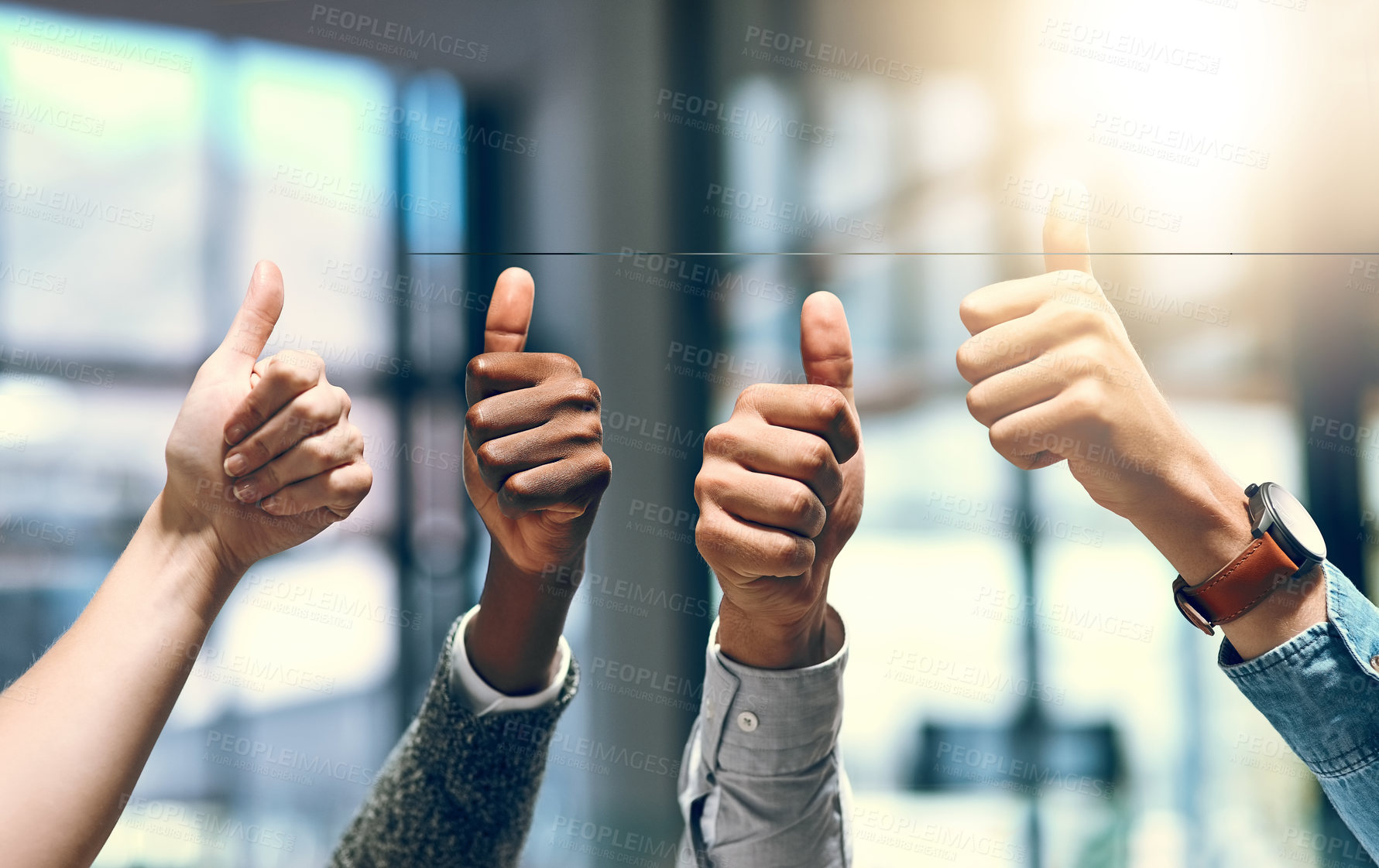 Buy stock photo Cropped shot of a group of unrecognizable businesspeople gesturing thumbs up