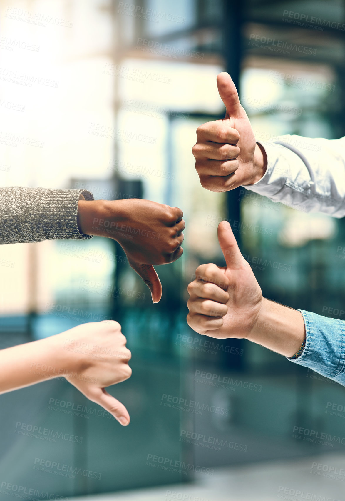 Buy stock photo Thumbs up, down and hands with people for vote, decision and startup feedback for creative agency. Teamwork, employees or managers with review gesture for yes, no and different opinion in workplace