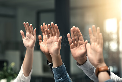 Buy stock photo Cropped shot of a group of unrecognizable businesspeople raising their hands