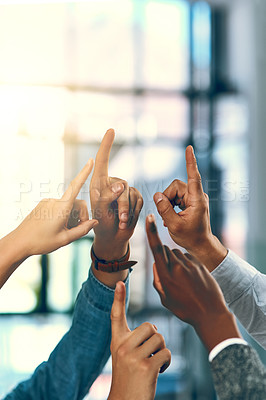 Buy stock photo Business people, fingers and crowd question in office, feedback and emoji for brainstorming vote. Employees, team building and hand up for problem solving or solution, workshop and staff opinion