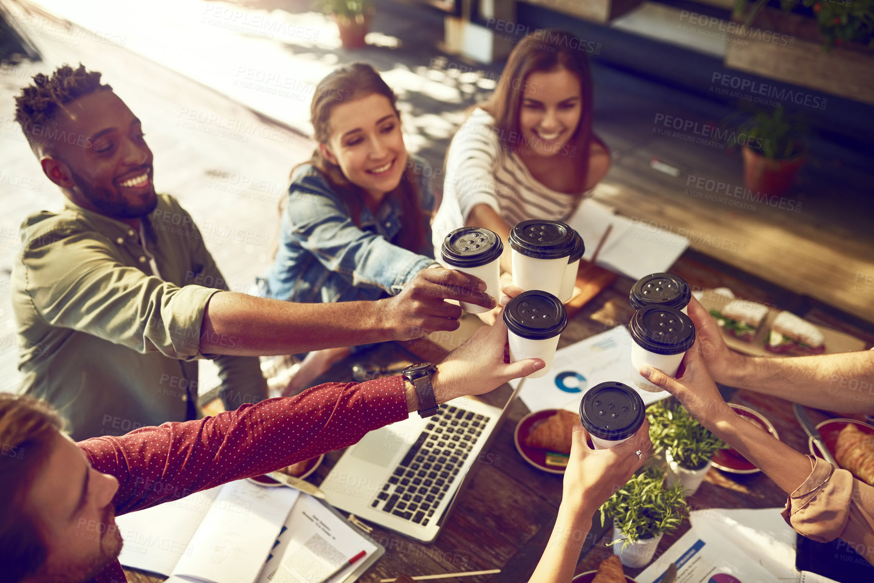 Buy stock photo Business people, coffee and cheers with top view in cafe for celebration, company success and financial growth. Team, employees and work social with toast for sales target, data analysis and profit