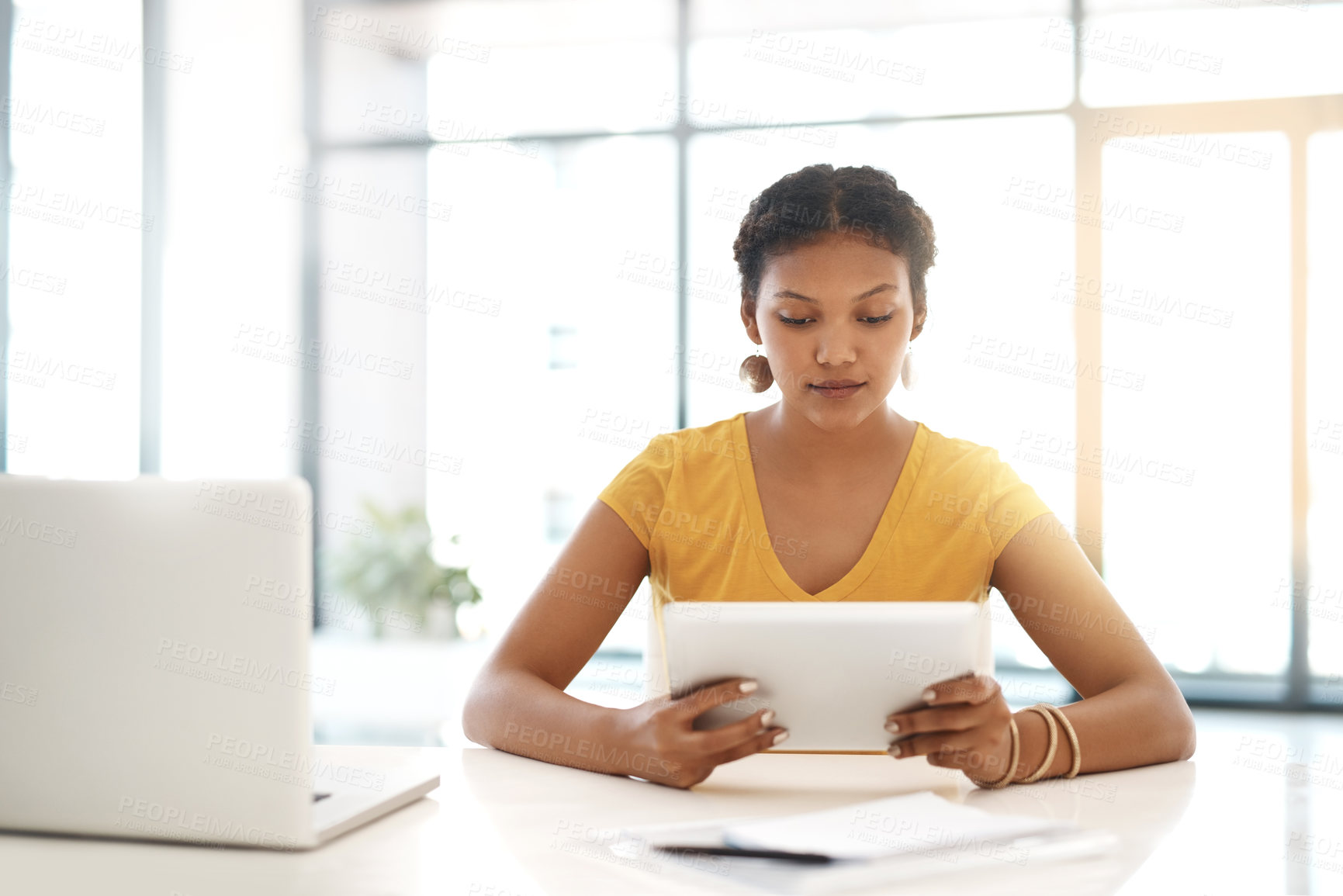 Buy stock photo Research, journalist or woman on tablet reading in office for copywriting, editing and creative agency for media. Startup, news story or writer with laptop for publication website and blog update