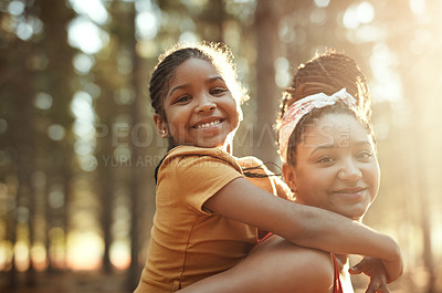 Buy stock photo Portrait of a mother and her little daughter bonding in the woods