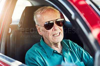 Buy stock photo Travel, driving and senior man with sunglasses in car for journey, destination or adventure in city. Retirement, driver and elderly person in vehicle for road trip, transportation or confidence