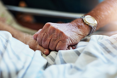 Buy stock photo Closeup shot of an unrecognizable senior man visiting his sick wife in hospital