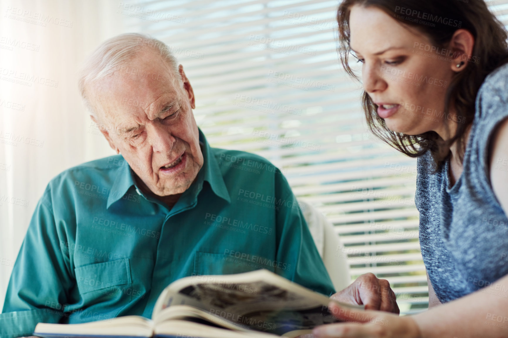 Buy stock photo Elderly father, daughter and looking at photo album with retirement, memory nostalgia and remember in home. Senior dad, woman and picture book for reminder, dementia and reflection for past life