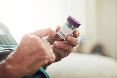 Buy stock photo Senior man, hands and reading medication with pills for prescription, chronic illness or sickness at old age home. Closeup of elderly male person checking container for medical dose or side effects