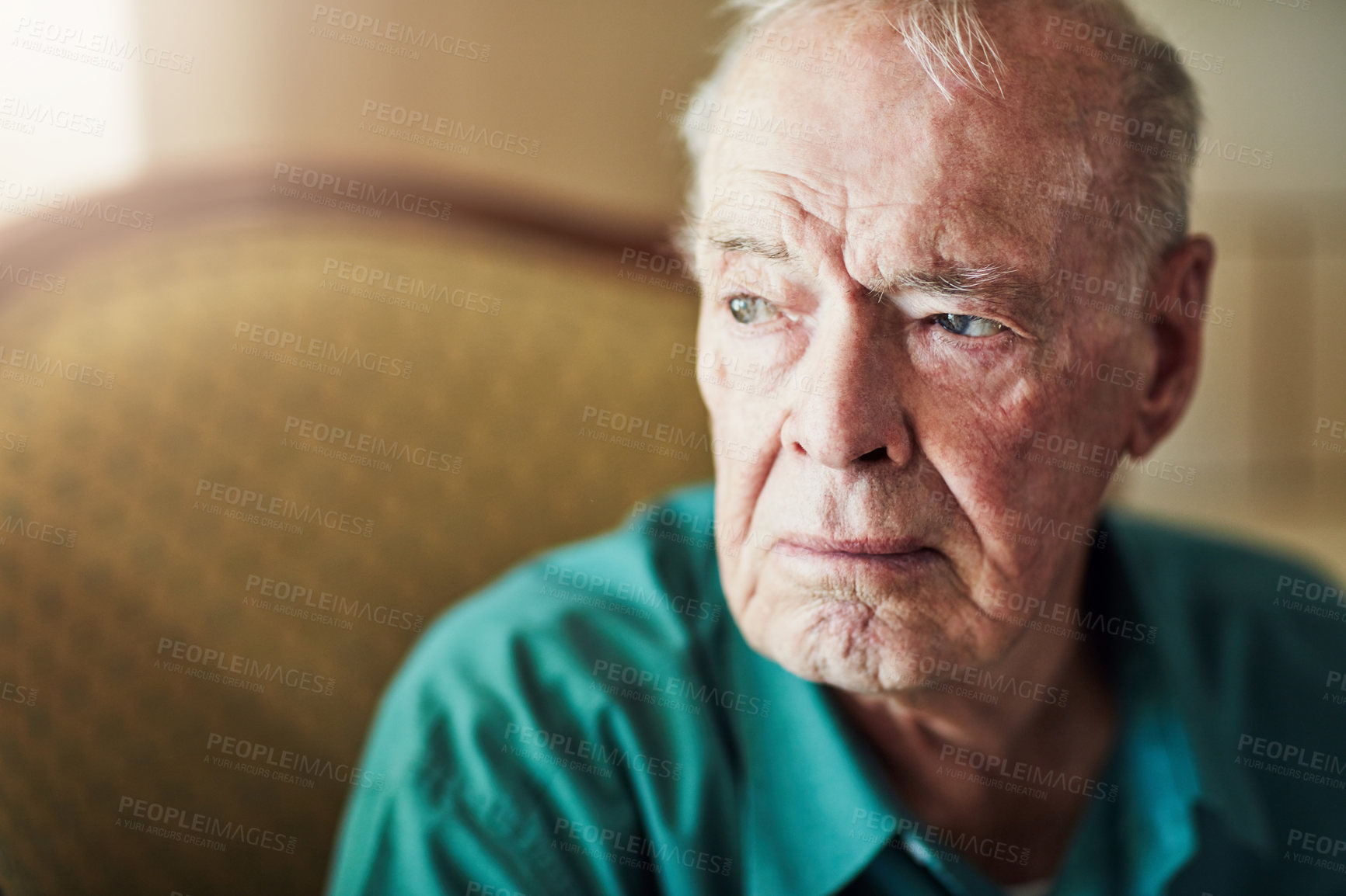 Buy stock photo Senior, man and sad with thinking of grief in retirement home with remember, nostalgia and memory on sofa. Elderly, person and lonely with alzheimers, depression and thoughtful on couch with mockup