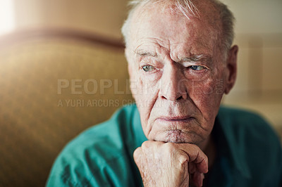 Buy stock photo Elderly, man and sad with thinking of memory in retirement home with remember, nostalgia or reflection on sofa. Senior, person and lonely with alzheimers, depression and thoughtful on couch in lounge