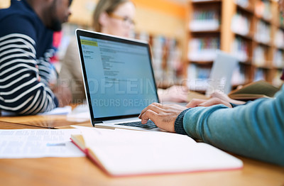 Buy stock photo Education, university and hands of student on laptop in library for learning, knowledge and research. School, college and person with computer, books and friends for project, studying or assignment