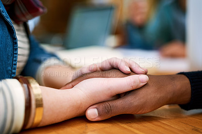 Buy stock photo Cropped shot of two people holding hands