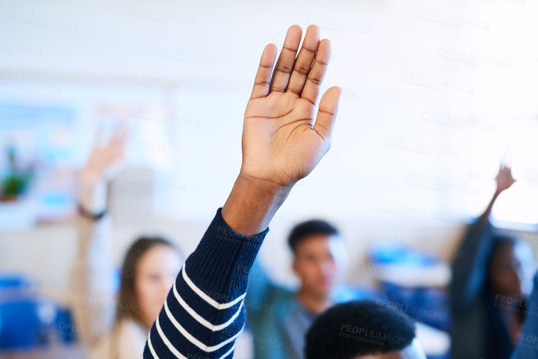 Buy stock photo Students, raised hand and classroom at college for question, learning and development with scholarship. People, education and together with sign for feedback, ideas and discussion at university