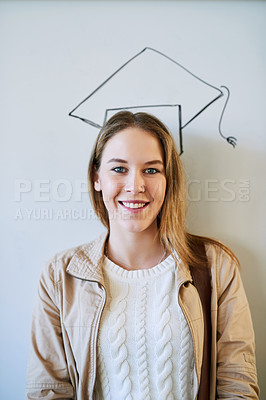 Buy stock photo Girl, student and drawing of graduation cap on board with smile, pride or bag for education at college. Woman, person and happy for sketch, portrait and learning in classroom at university in Germany