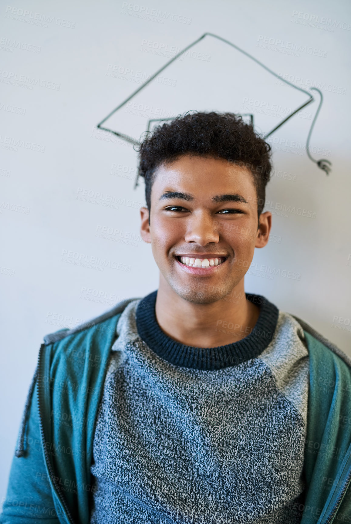 Buy stock photo Man, board and sketch of graduation cap at college in portrait for smile, pride or education. Excited person, happy and drawing in classroom for learning, scholarship or icon for success in Mexico