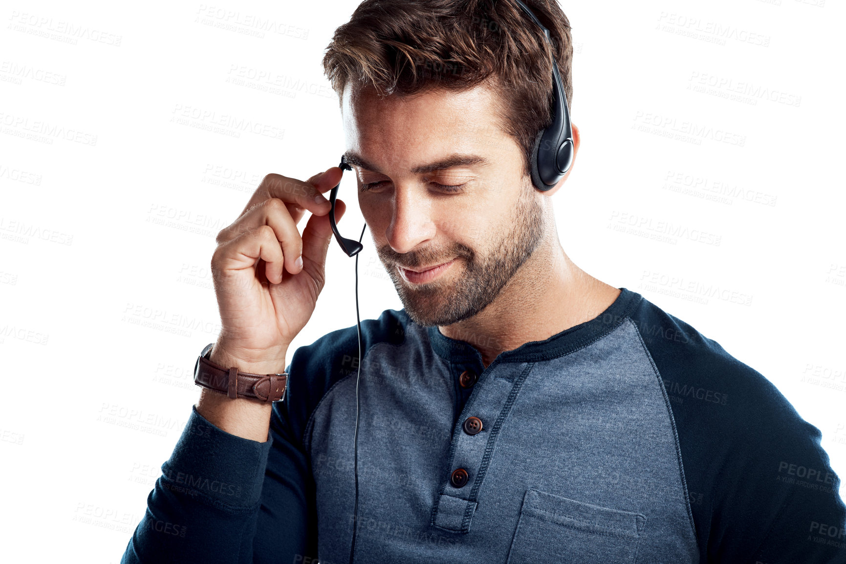 Buy stock photo Man, headset and happy in studio as call center agent in white background for customer service.  Employee, smile and confident with microphone for crm with pride for client support and advice