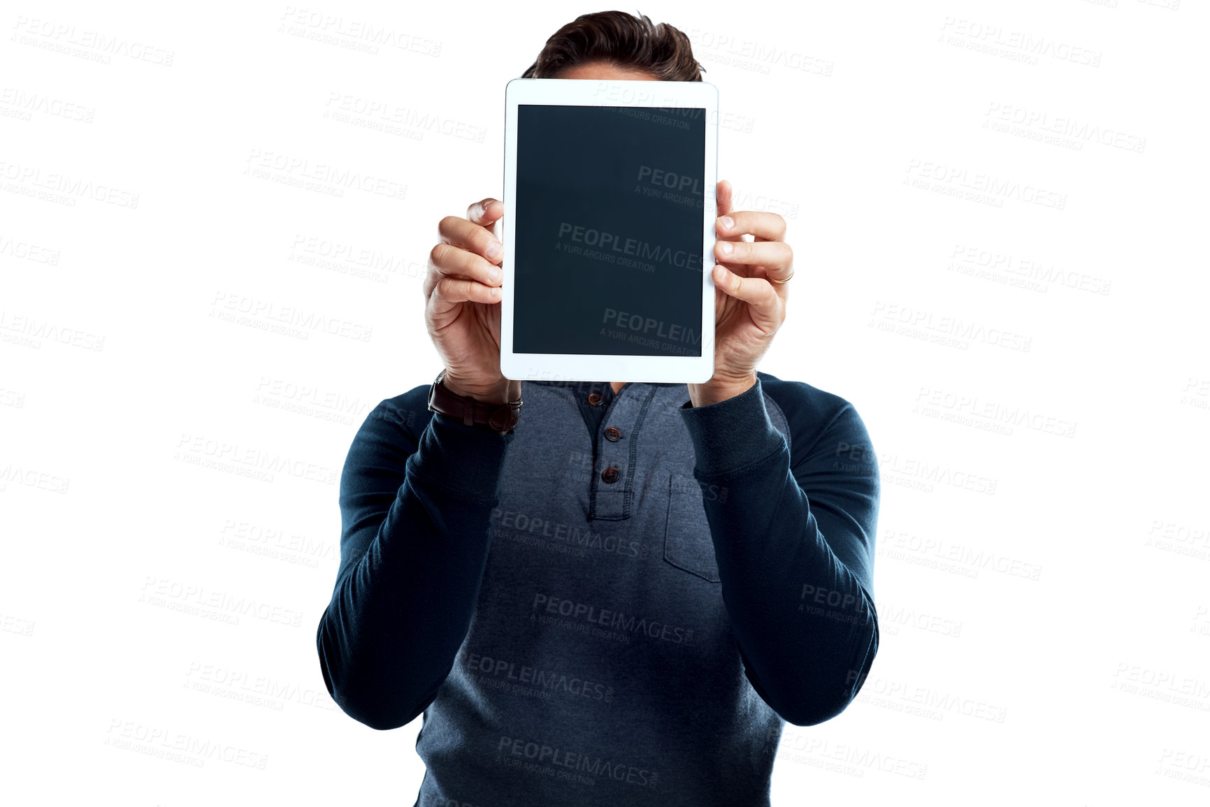 Buy stock photo Studio shot of a young man holding a digital tablet with a blank screen against a white background