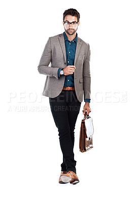 Buy stock photo Studio shot of a handsome young man posing against a white background
