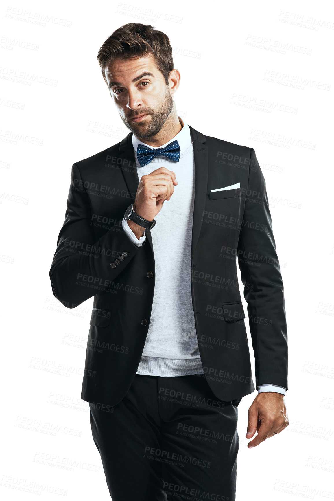 Buy stock photo Studio shot of a handsome young man wearing a tuxedo against a white background