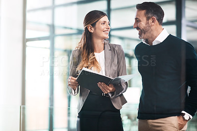 Buy stock photo Man, woman and paperwork for discussion in office for teamwork, reading or review for proposal. Business people, partner and attorney for feedback, compliance or conversation for results in workplace