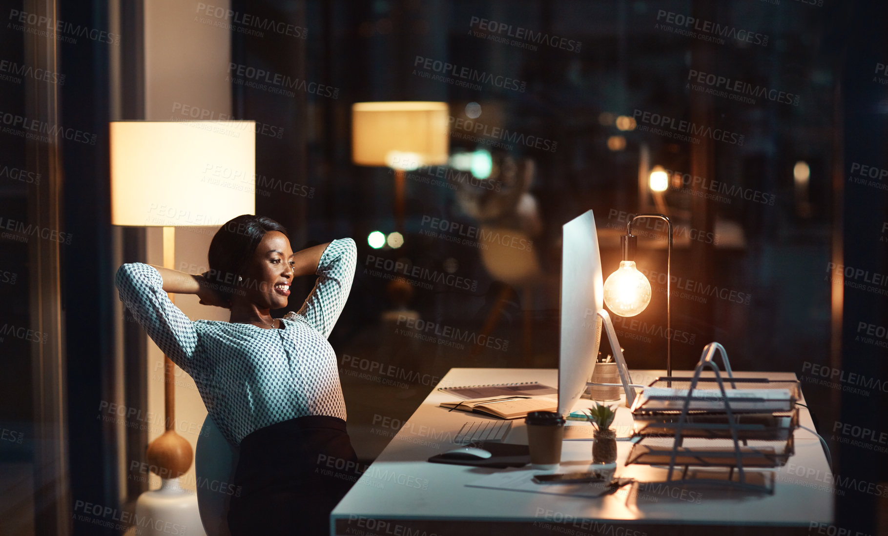 Buy stock photo Business, woman and smile at desk with stretching for web design success, relax and productivity at night. Designer, person and satisfied in office for completed work, resting and done with project