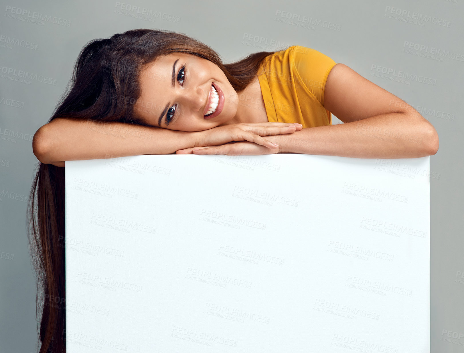 Buy stock photo Poster, happy and portrait of woman in studio for news, announcement and information. Fashion, advertising and person with sign, bulletin or banner for sale, deal and bargain on grey background