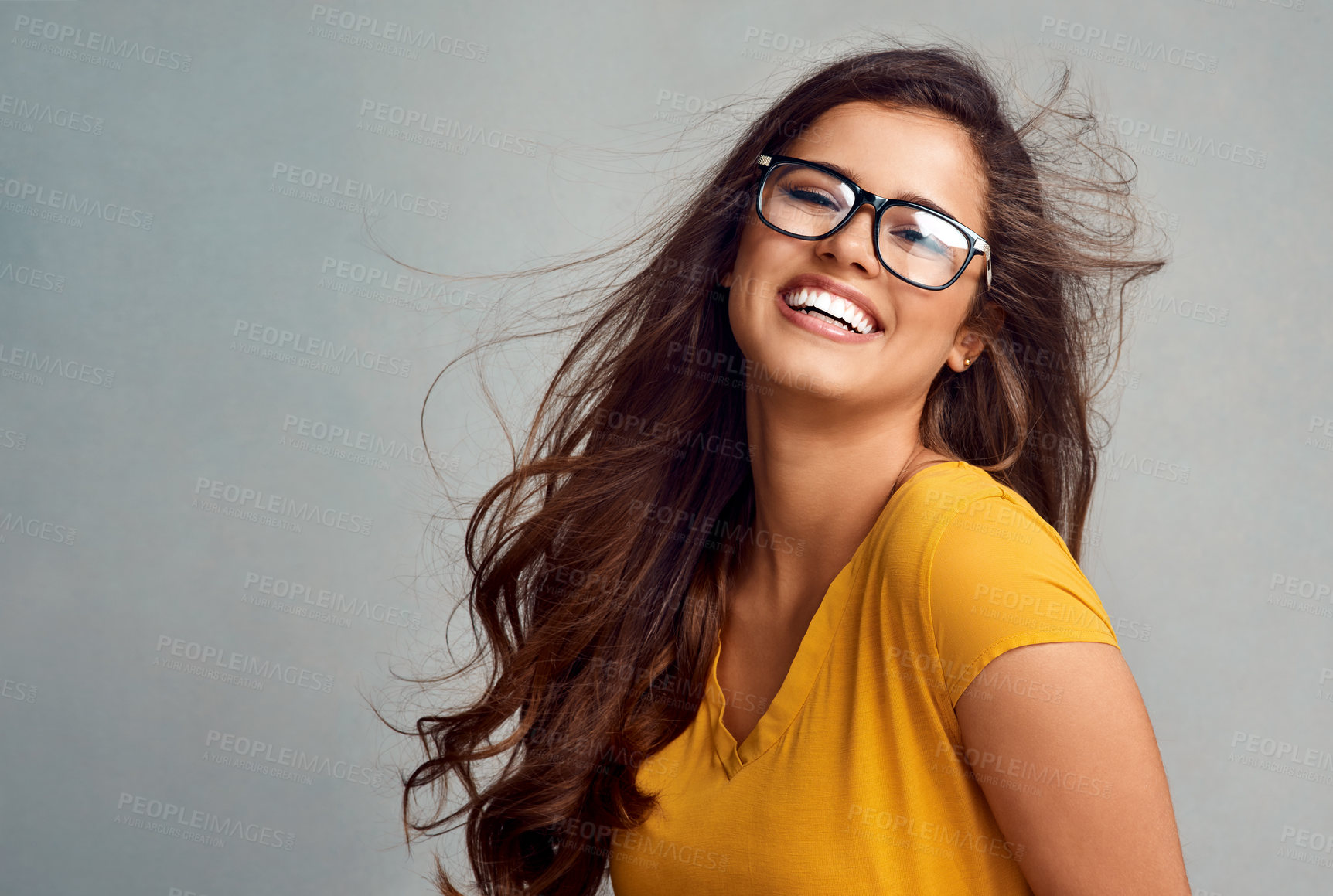 Buy stock photo Studio, happy and portrait of woman with glasses, confidence and mockup space in trendy fashion. Smile, face and girl in gen z style with pride, vision and eye care wellness on grey background