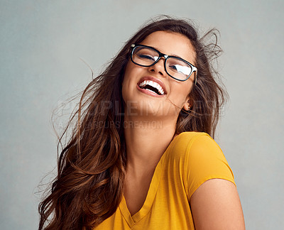 Buy stock photo Studio, laugh and portrait of girl with glasses, confidence and positive attitude in trendy fashion. Happy, face and woman in gen z style with pride, vision and eye care wellness on grey background