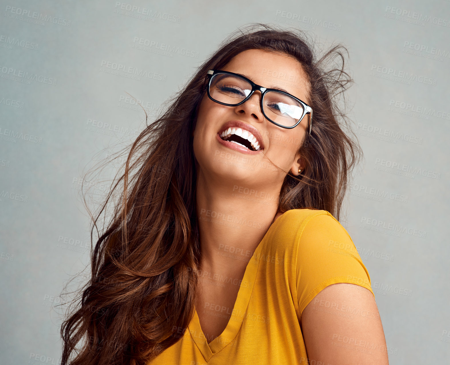 Buy stock photo Studio, laugh and portrait of girl with glasses, confidence and positive attitude in trendy fashion. Happy, face and woman in gen z style with pride, vision and eye care wellness on grey background