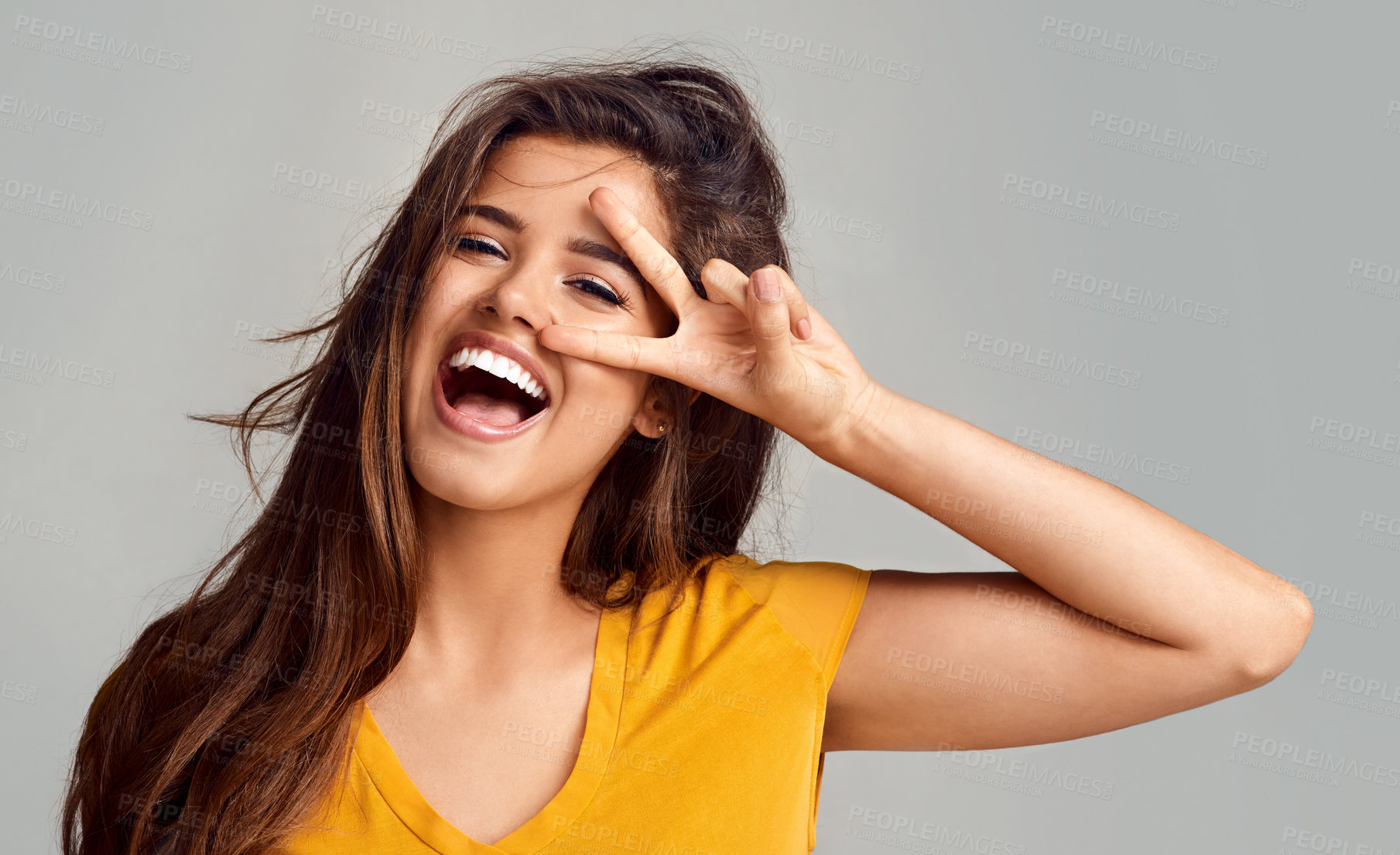 Buy stock photo Peace sign, smile and female model with portrait in studio with happiness for freedom, good mood or face expression on white background. V, emoji and woman for hand gesture, positivity or confidence