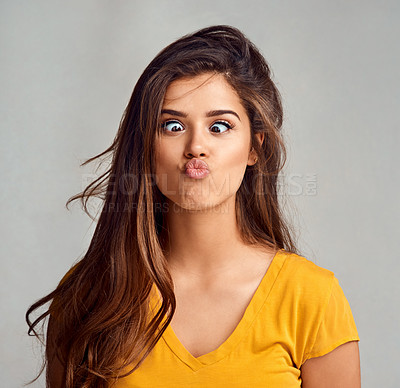 Buy stock photo Pout, goofy and face of woman in studio with crossed eyes for emotion, facial expression and crazy reaction. Comic, humor and isolated person with emoji, silly and funny pose on gray background